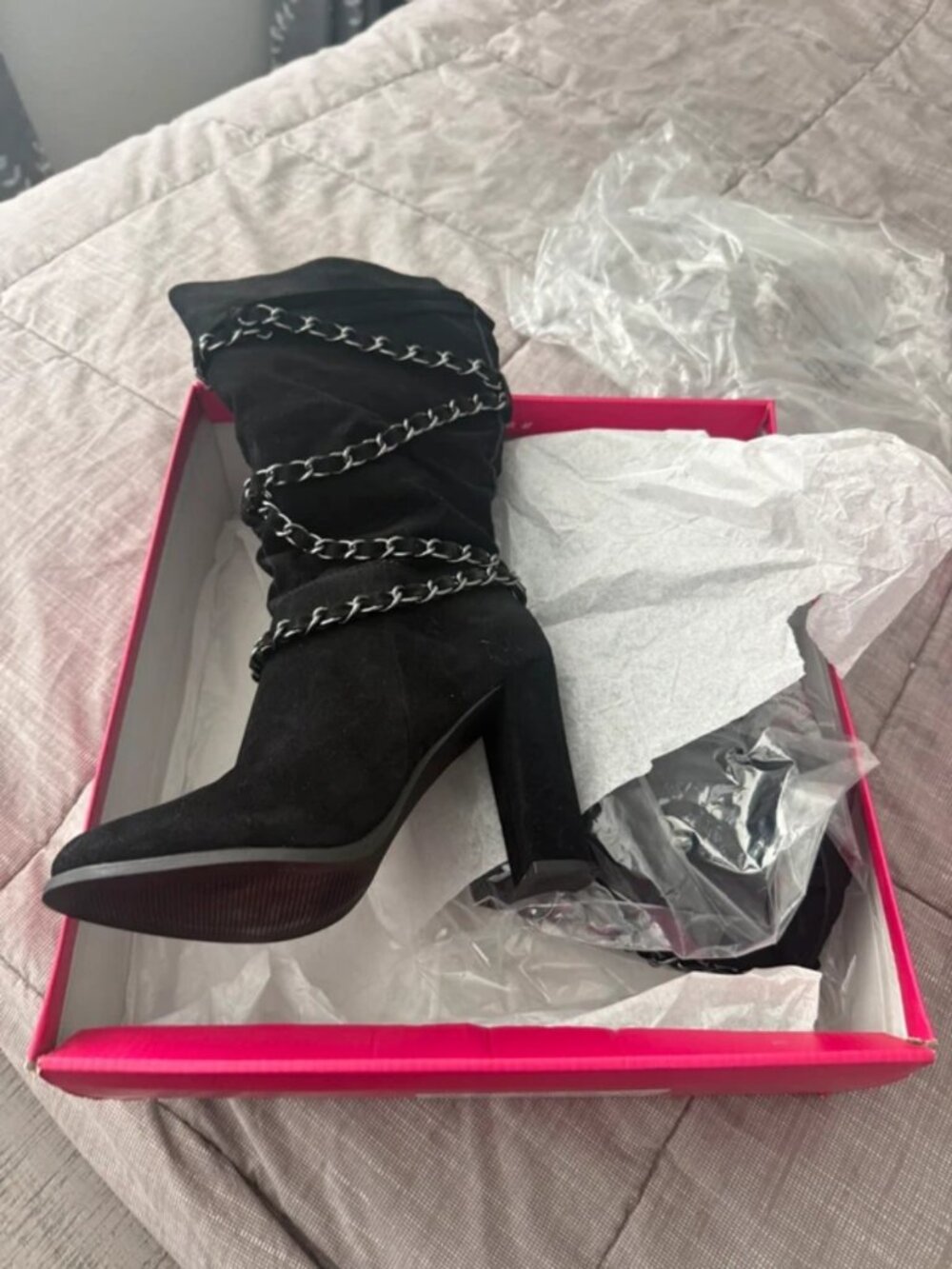 Black suede boots with cute leather medal chain around top of boot.